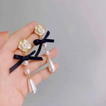 Luxo Pérola Arco Camellia Pendurar Brincos Incomum moda jóias 2021 Acessórios para mulheres